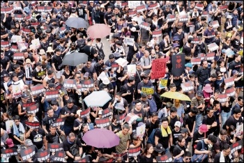 Mass protest in Hong Kong for democratic rights, photo by VOA/CC