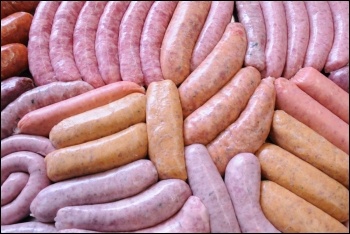 Karro Food workers process pork products, photo by Jane Charlesworth/CC