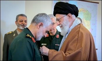 Suleimani being decorated by Iran's supreme leader Ali Khamenei, photo Khamenei.ir/CC