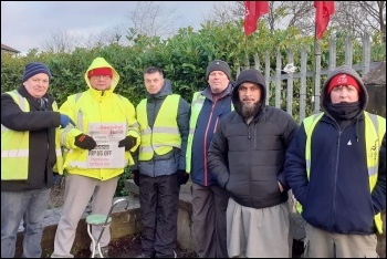 Westex Carpets strikers displaying the Socialist front page 