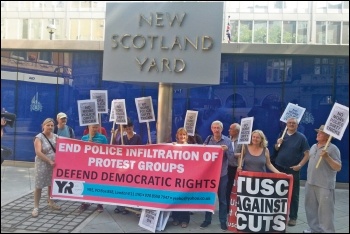 Socialist Party members and trade unionists protesting against political policing at New Scotland Yard, photo by Socialist Party