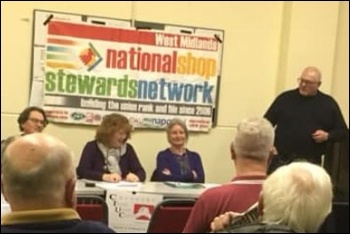 Clive (stood, right) speaking at a Coventry meeting of the NSSN, photo by Socialist Party