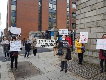 Protesters in Ireland outside Debenhams 30 April photo Stand With Debenhams Workers