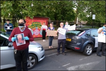 Protesting against Covid deaths and Labour council cuts in Newham, photo by Dave Carr