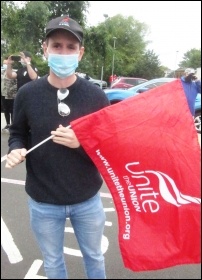 Holding a Unite flat at a protest rally of Nissan workers outside their Sunderland plant. 11.7.20, photo Elaine Brunskill Holding a Unite flat at a protest rally of Nissan workers outside their Sunderland plant. 11.7.20, photo Elaine Brunskill