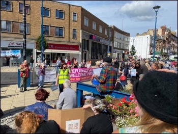 Eric Segal speaking to the crowd at the demo