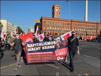 SOL members march with public sector strikers in Berlin, photo SOL