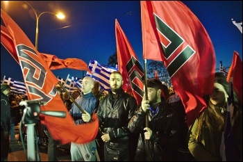 Golden Dawn fascists displaying swastika-like flags, photo DTRocks/CC