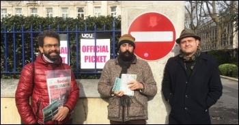 Unison general secretary candidate and Socialist Party member Hugo Pierre, left, supporting a UCU picket line in February 2020
