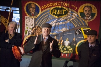 Steve Hedley (centre) speaking at an RMT picket line, photo Paul Mattsson