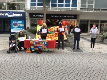 Socialist Party members in Plymouth supporting a protest outside Debenhams