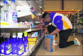 Supermarket worker USAF photo, Jennifer Zima/CC Supermarket worker USAF photo, Jennifer Zima/CC