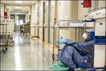 Hospital workers are feeling the strain, photo Alberto Giuliani/CC