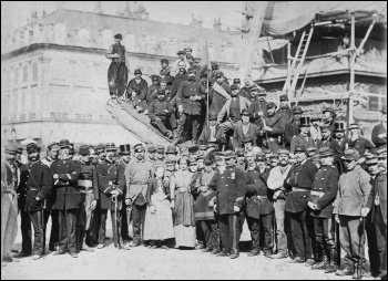 Communards on the barricades during the 1871 working-class uprising in Paris