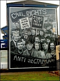 A mural in Derry depicting the 1960s civil rights movement - the beginning of the ‘Troubles’ in Northern Ireland. Partition by the British ruling class created the Frankenstein monster of sectarianism, that has turned upon its maker, photo Suzanne Mischys