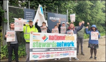 Protesting in Enfield, London, in support of electricians sacked by contractor SIS Systems at Amazon's warehouse under construction at Follingsby Park, Gateshead. 21.6.21