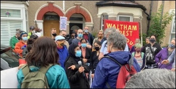 Eviction resistance in Walthamstow, London, 29.6.21. Nadia addressing the crowd after bailiffs say they're not entering her home today!, photo Waltham Forest SP