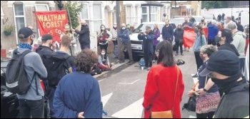 Protesters gather to see of the baliffs. Photo: Martin Reynolds Protesters gather to see of the baliffs. Photo: Martin Reynolds