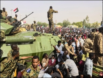 Soldiers stand guard during the 2019 revolution, Khartoum. Photo: Agence France-presse/CC