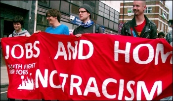 Jobs and Homes Not Racism - Youth Fight For Jobs banner on anti-EDL demonstration in Tower Hamlets, London, June 2010, photo East London Socialist Party