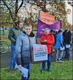 Adam selling the Socialist at UCU picket lines in Reading