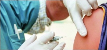 Mandatory vaccination is being used as an attempt by bosses and the government to divide workers Photo: Christian Emmer/CC