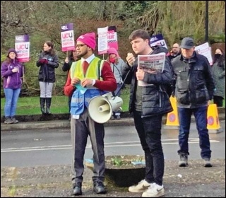 Socialist Party member Oisin Mulholland showing solidarity on the UCU picket line at Swansea University