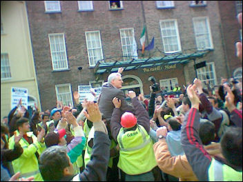 Joe Higgins and the victorious Gama workers