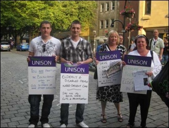 Bolton protest at council meeting against plans to savagely cut 40% off its budget, , photo Hugh Caffrey Bolton protest at council meeting against plans to savagely cut 40% off its budget, , photo Hugh Caffrey