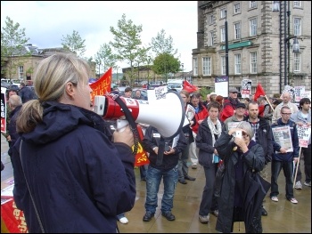 Jackie Grunsell addresses Kirklees Save Our services trade union protest against cuts, photo Huddersfield Socialist Party Jackie Grunsell addresses Kirklees Save Our services trade union protest against cuts, photo Huddersfield Socialist Party