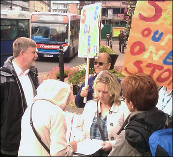 Socialist Pary councillor Dave Neillist joins Stoke Aldermoor residents to lobby Coventry council to save their local council neighbourhood management one stop service office., photo Coventry Socialist Party