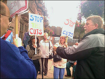 Socialist Pary councillor Dave Neillist joins Stoke Aldermoor residents to lobby Coventry council to save their local council neighbourhood management one stop service office., photo Coventry Socialist Party