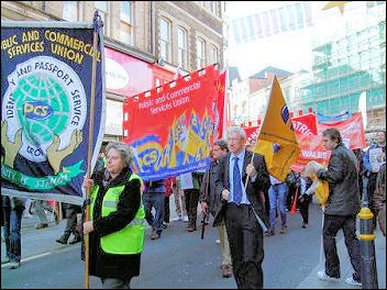 Newport Demo to save the Passport Office: John McInally, Vice president, Public and Commercial Services union, with the IPS group banner , photo Socialist Party Wales