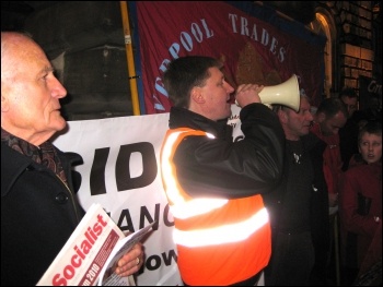 Liverpool lobby of council: Tony Mulhearn (holding The Socialist), waiting to speak, Daren Ireland, RMT and President of Liverpool TUC, addressing demo , photo by Merseyside Socialist Party