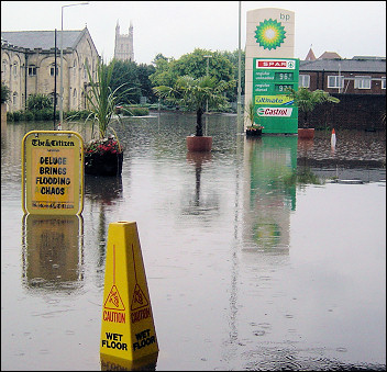 Caution wet floor - flooding in the centre of Gloucester