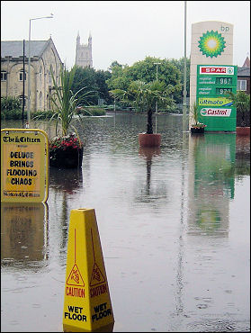 Caution wet floor - flooding in the centre of Gloucester, photo Chris Moore