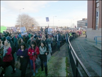 Over 1,400 students from Holy Cross sixth form college and Bury College walked out and marched to a huge rally outside Bury town hall, photo by Paul Gerrard