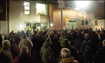Hundreds of campaigners against the government's forests sell-off plans wait to quiz Tory MP in Coleford, photo www.handsoffourforests.org