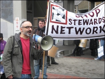 Onay Kasab addresses 200 trade unionists, community campaigners and service users who marched in Feb 2011 in Greenwich, south London, against the local council's brutal cuts package, photo Lorraine Dardis