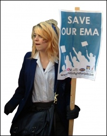 Save our EMA - student demonstrates against the cuts with Youth Fight for Jobs placard