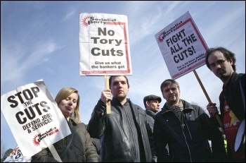 Thousands of workers, students and anti-cuts campaigners marched through Cardiff on Saturday 5 March to tell visiting Con Dems we don't accept your cuts, photo Paul Mattsson