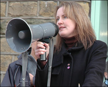 Jackie Grunsell, GP and councuillor, speaks at a Save Huddersfield NHS demonstration, photo Huddersfield SP