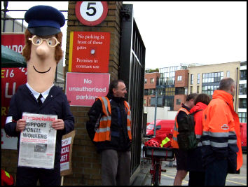 Postman Pat joins the CWU picket line in East London, photo Naomi Byron