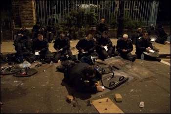 Police taking notes, Tottenham riots, August 2011, photo Paul Mattsson