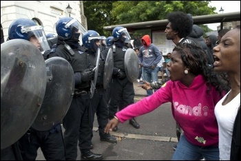 Riot police in Hackney, photo Paul Mattsson