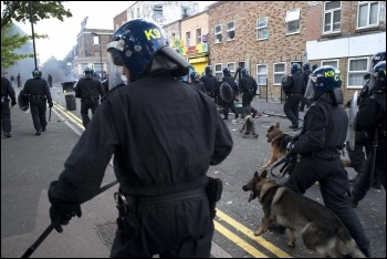 Riot police with dogs, Hackney, August 2011, photo Paul Mattsson