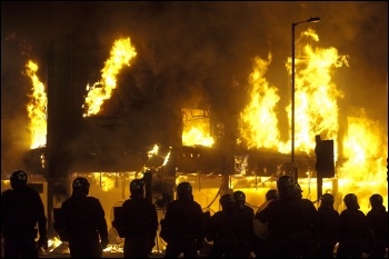 Building on fire in Tottenham riots, August 2011, photo Paul Mattsson