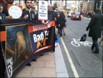 Locked-out Sotheby's workers and supporters behind banner, London 13.10.11, photo Kevin Parslow