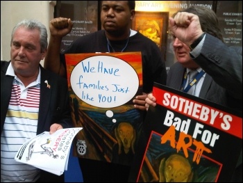 Locked out Sotheby's worker with Unite's AGS Tony Burke (right) and EC member Dave Mathieson, photo Kevin Parslow