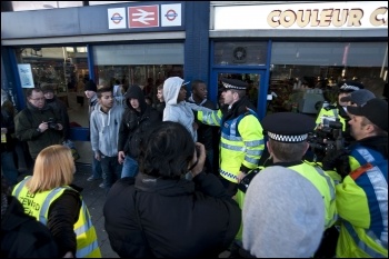 EDL demostration in Barking: A victim of EDL racist abuse is photographed by the Forward Intelligence Team and told to move on or face arrest EDL demostration in Barking: A victim of EDL racist abuse is photographed by the Forward Intelligence Team and told to move on or face arrest